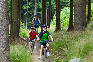A Family on a guided bike tour near Luss